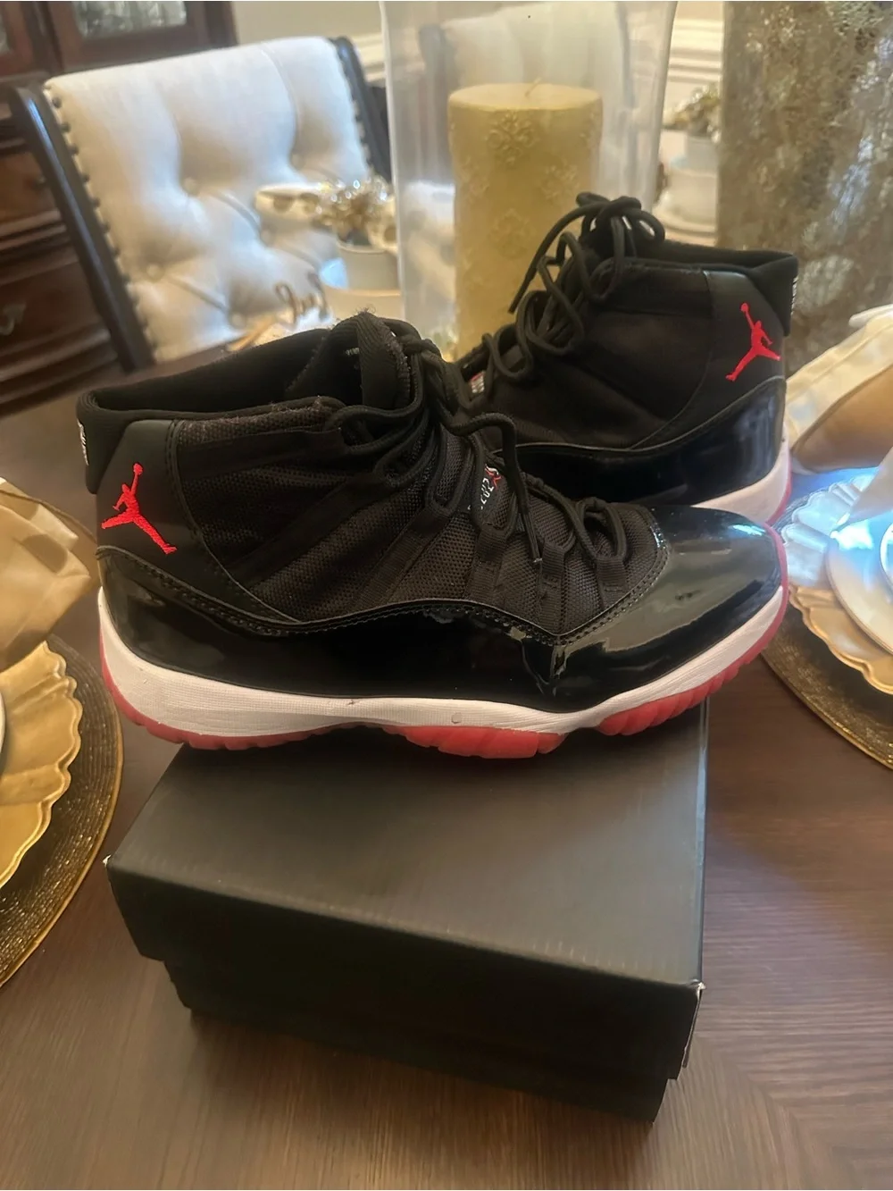 Slightly worn Jordan men’s Size 10 High-Top Sneakers in Black with Red Accents